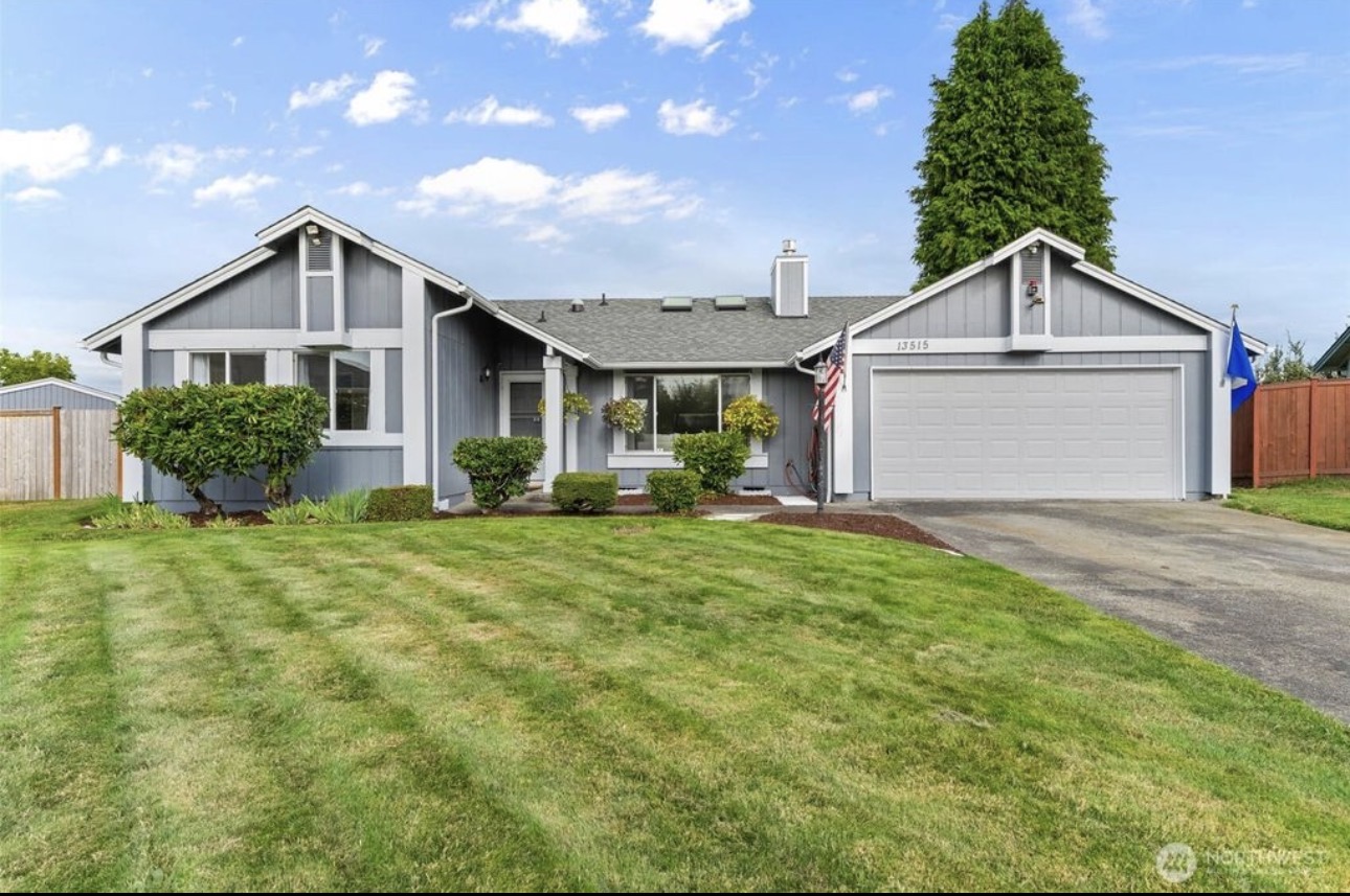 Two gable family home with two car garage